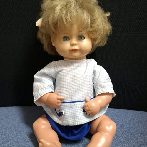 Vintage doll like new with child face, 30 cm tall