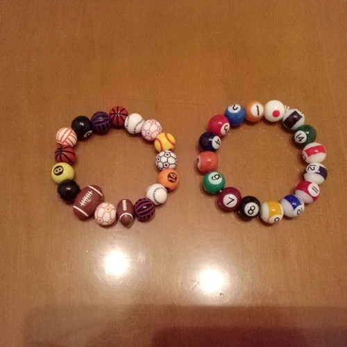 Bracelets new with billiard and sports balls, set of 2 pieces