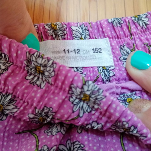 Zara girls' shorts skirt, pink with daisies, age 11-12