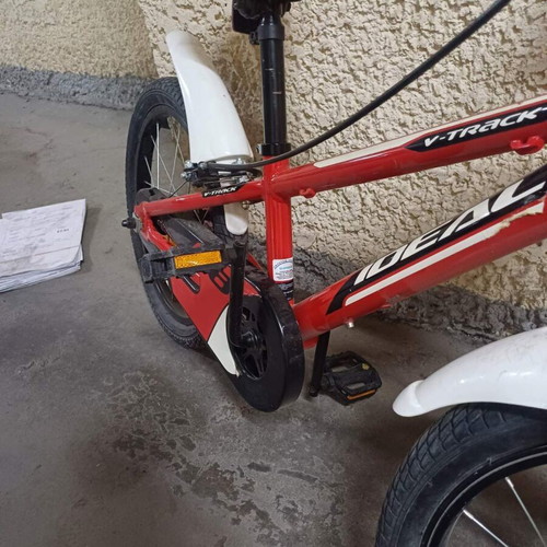 BMX bike 18" red for children, used with training wheels and basket