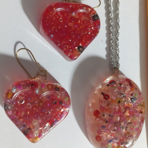 Set of 9 handmade resin pendant and earring jewelry sets, multicolor