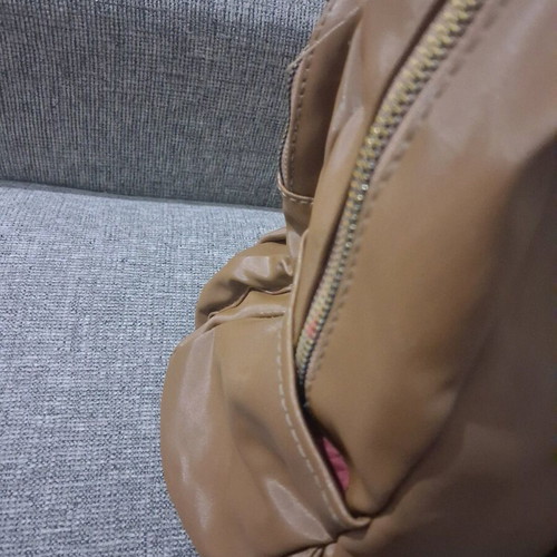 Backpack like new brown with gold zippers