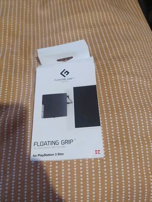 Floating Grip Wall Mount PS3 Slim Black like new