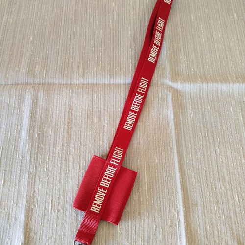 Lanyard used, red with elastic case for small phone
