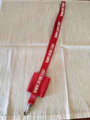 Lanyard used, red with elastic case for small phone