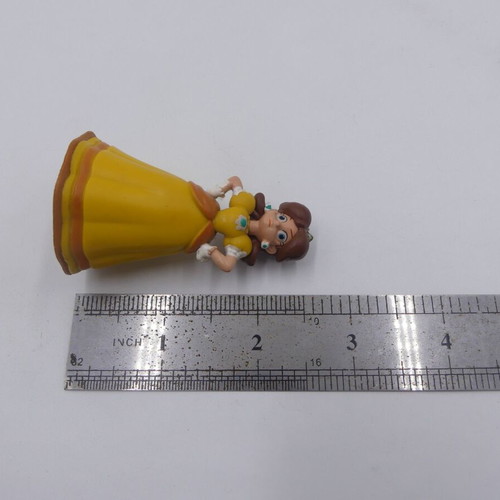 Nintendo Super Mario Bros Princess Daisy figure used 2.5 inches tall 2007