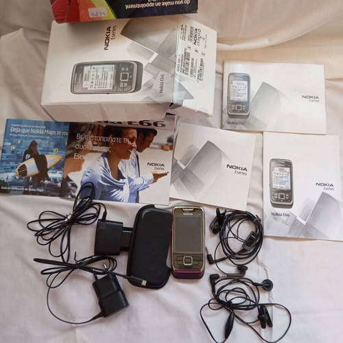 Nokia E66 retro slider phone used with original accessories