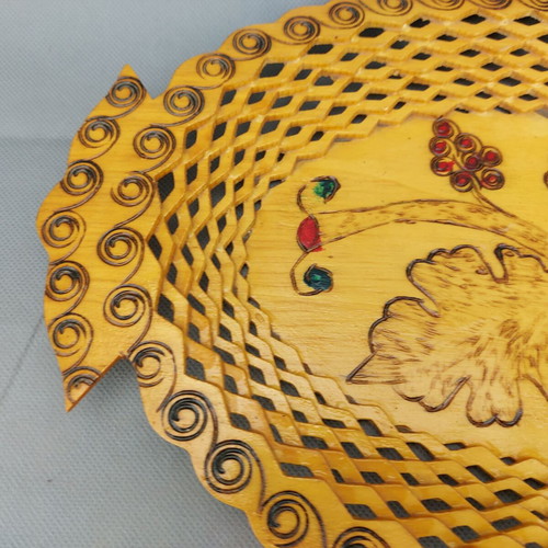 Old beautiful wooden fruit plate used