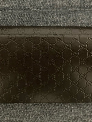 Gucci case like new, black and gray