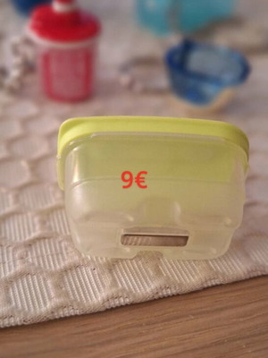 Tupperware keychains new, assorted colors