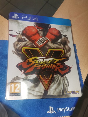 Street Fighter V PS4 Special Edition Steelbook like new, PAL English