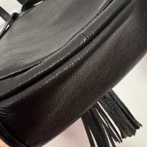 Leather backpack black like new with zipper pockets and magnetic clasp