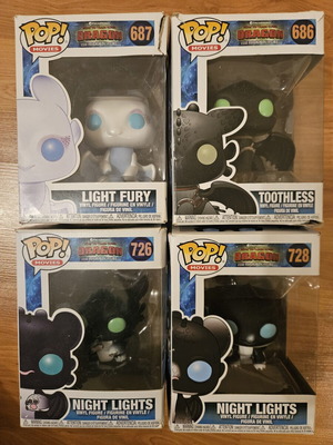 Funko Pop bundle of four How to Train Your Dragon figures used, damaged boxes