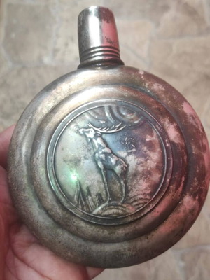 Silver flask for alcohol used, early 20th century detailed design