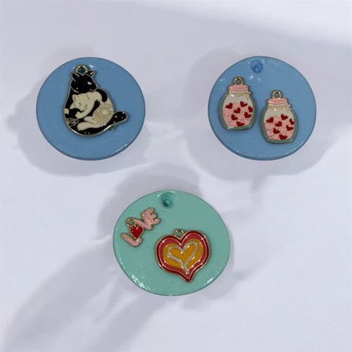Clay magnets and keychains set of 3 like new