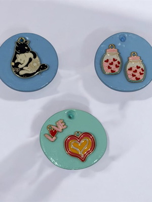 Clay magnets and keychains set of 3 like new