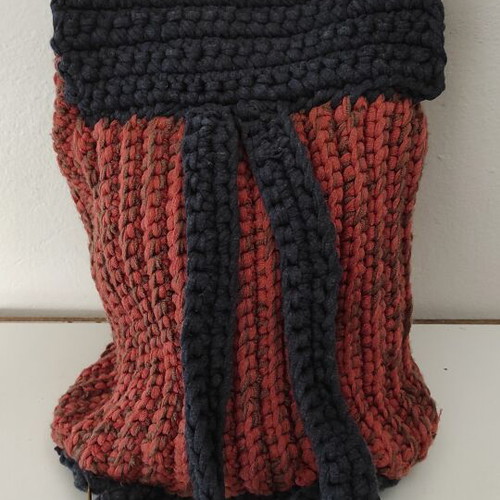 Knitted backpack like new, orange with leather hamsa detail