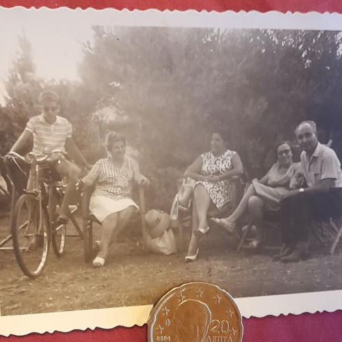 Vintage black and white family photo with bicycle, like new