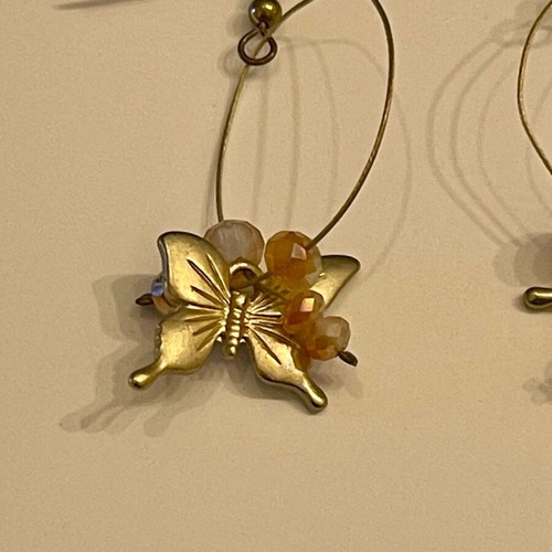 Earrings like new with butterfly and beads