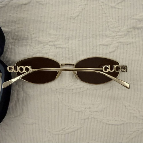 Gucci women's sunglasses GG1802S 005 with gold metal frame and brown lenses new
