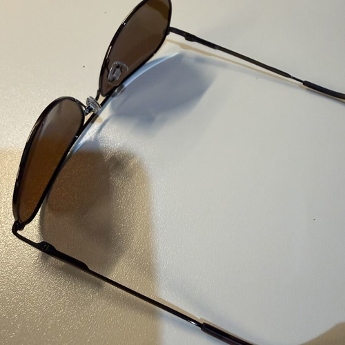U.S. POLO ASSN. Aviator sunglasses like new, black metal frame, brown lenses