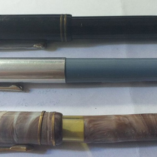 Set of 3 collectible pens with gold plating and slightly deformed body