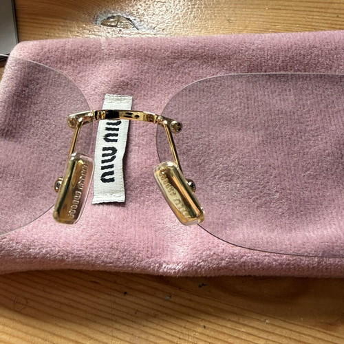 Miu Miu sunglasses, grey and gold
