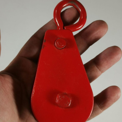 Heavy-duty metal lifting pulley block used