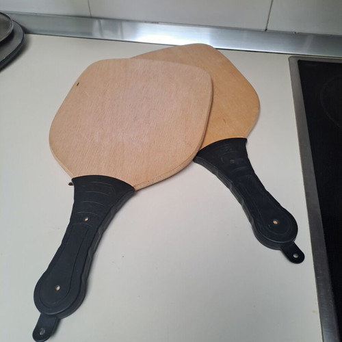 Wooden rackets used, length 41.5cm, width 22cm