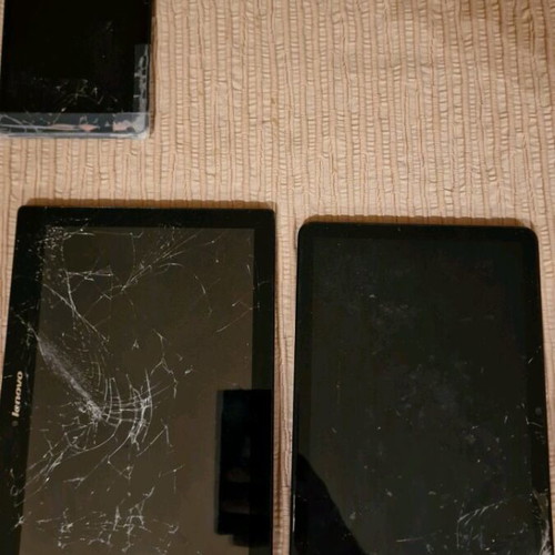 Various tablets used with damages for spare parts