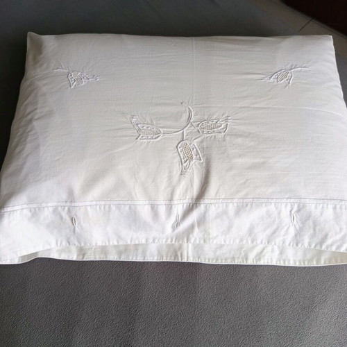 Vintage white cotton pillowcases pair with embroidery used