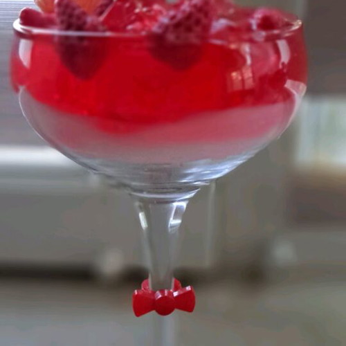Soy and gel wax candle in cocktail glass with strawberry and blueberry scent