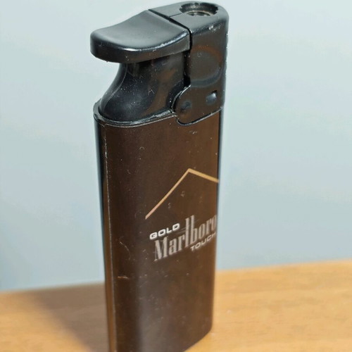 Marlboro collectible windproof lighter used, functional