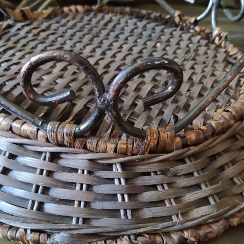 Woven rattan tray used with metal frame