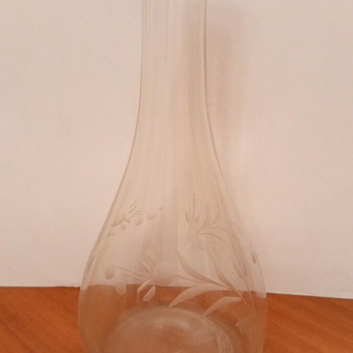 Vintage glass carafes with engraved floral design, pair