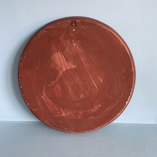 Embossed handmade decorative wall plate used with Paros motif