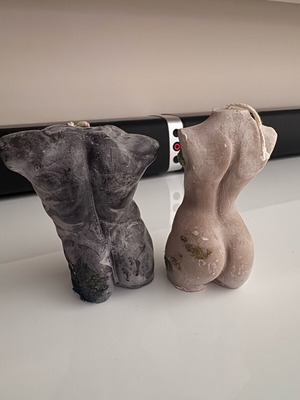 Set of soy candles shaped as female and male bodies like new
