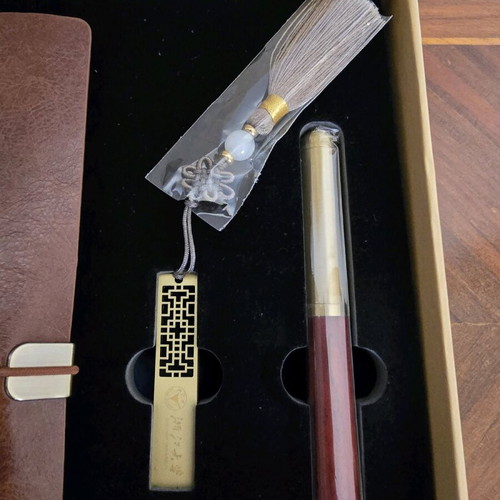 Zhejiang University collectible memorabilia set new with pen, flash drive, and notebook