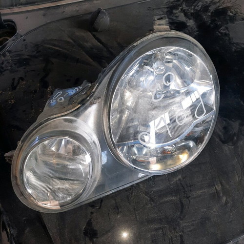 Vw Polo 05mod left front headlight used, broken mount