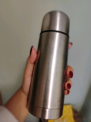 Metal thermos used with screw cap
