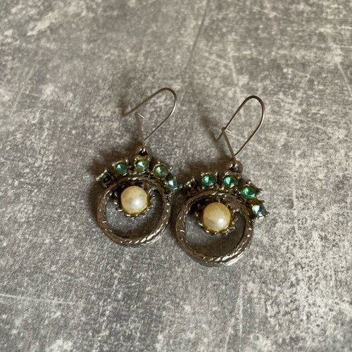 Dangling earrings used with turquoise and silver designs