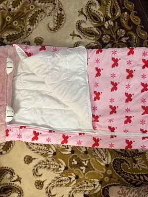 Sleeping bag used, foldable with one button missing