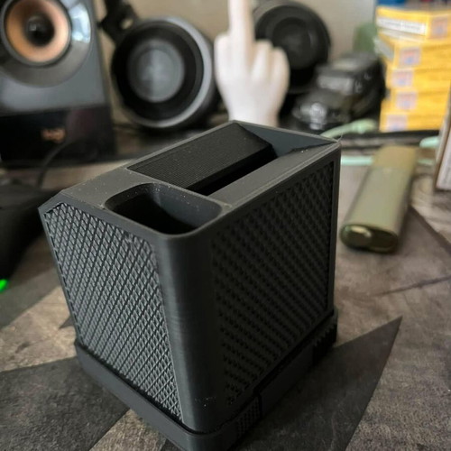 Icos holder with built-in ashtray