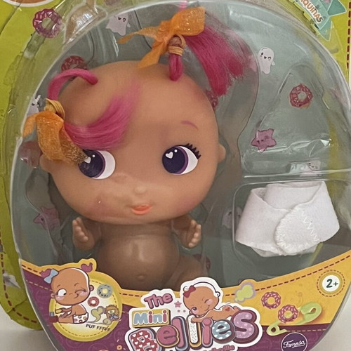 The Bellies Mini Yummy doll used, pink hair, orange bows