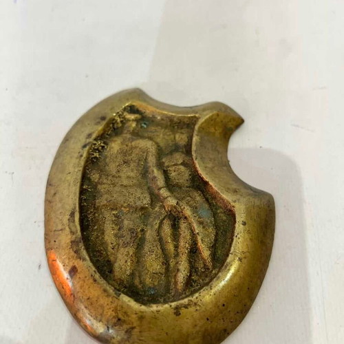Vintage brass ashtray with embossed World War I scene used