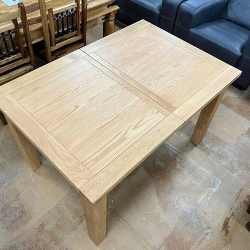 Wooden dining table new with extendable feature
