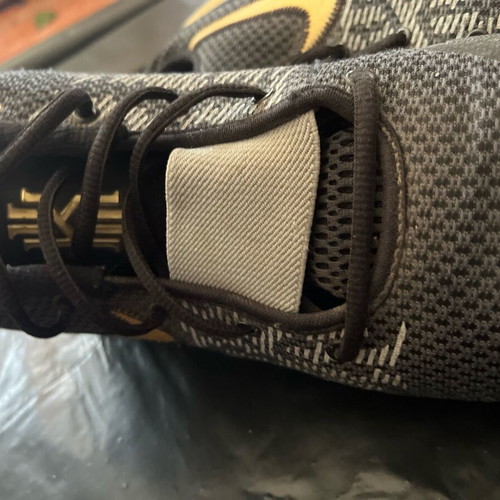 Nike athletic shoes size 42.5 used, black and gold