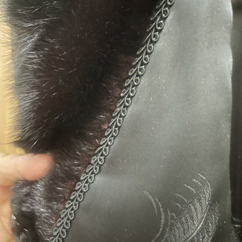 Astrakhan fur coat with mink collar