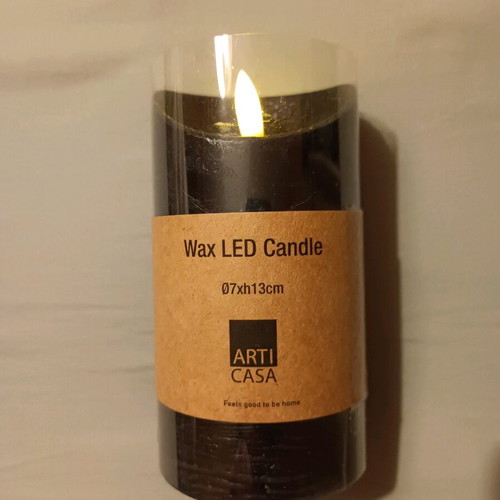 Decorative plastic candle new, black, battery operated