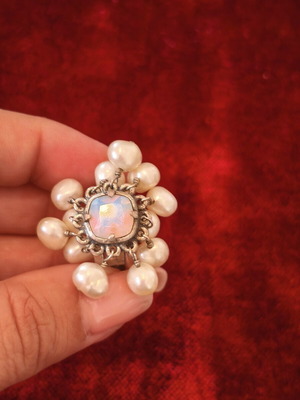 Dyrberg/Kern statement ring used with pearls and iridescent stone